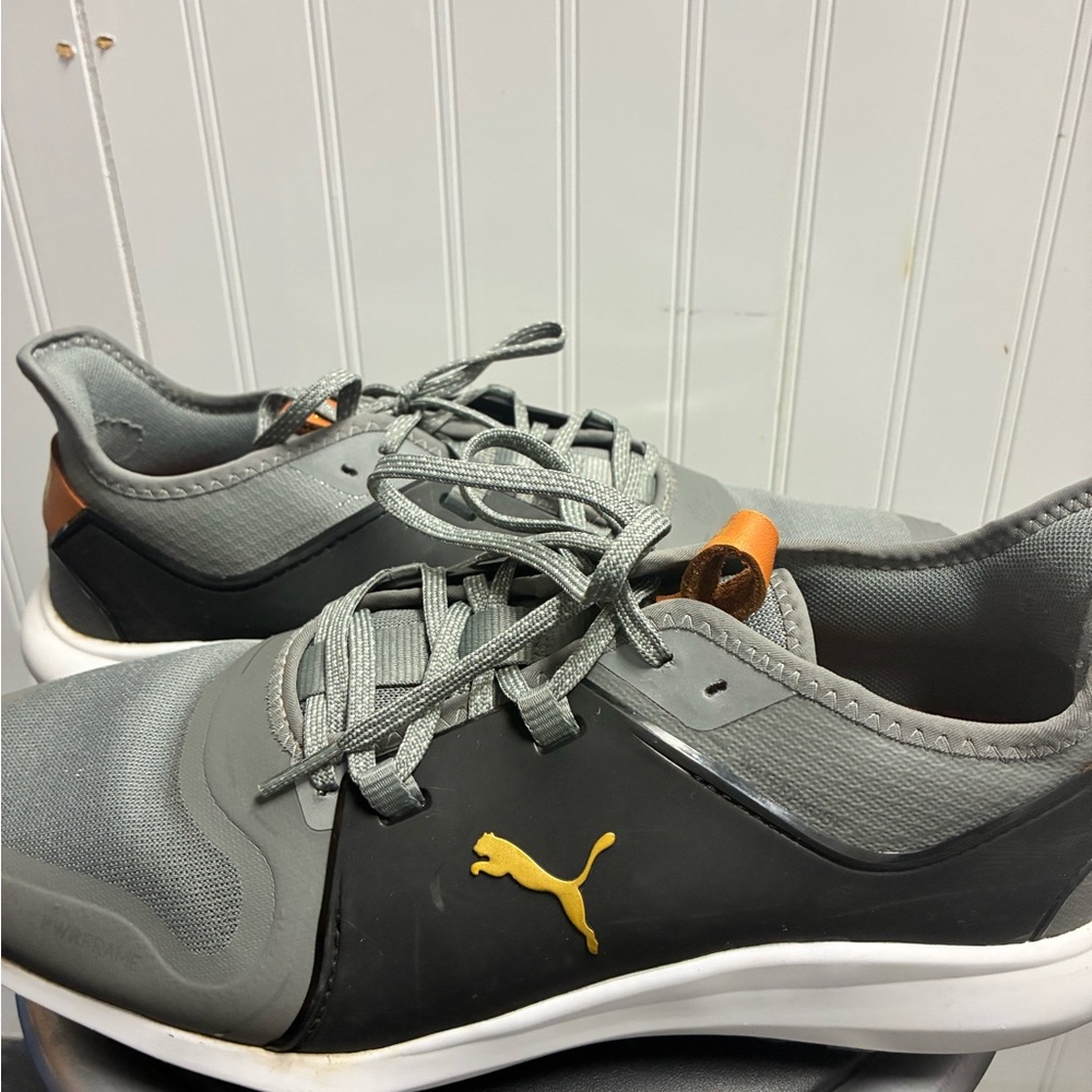 Puma Men's Gray and Black Sneakers with Gold Accent